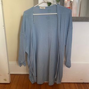 this is a light weight cardigan! it’s medium size!